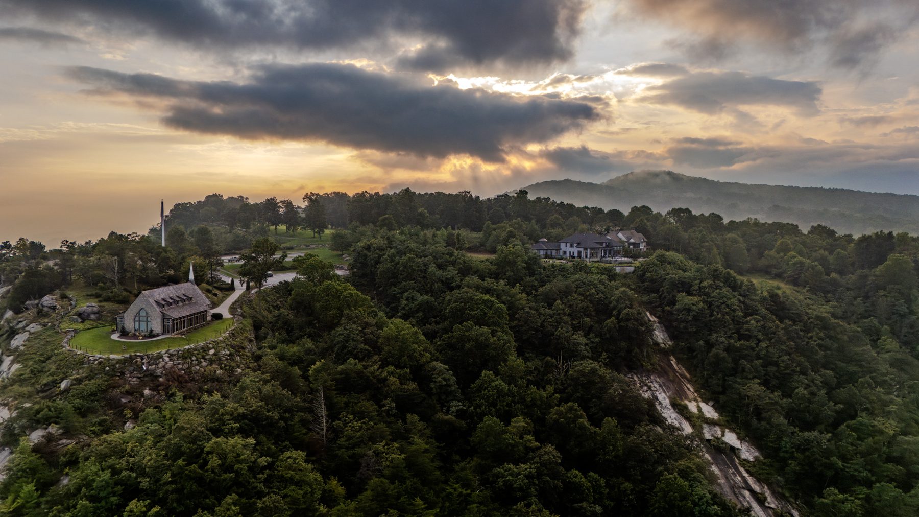 The Cliffs at Glassy at golden hour, Blue Ridge mountains beyond