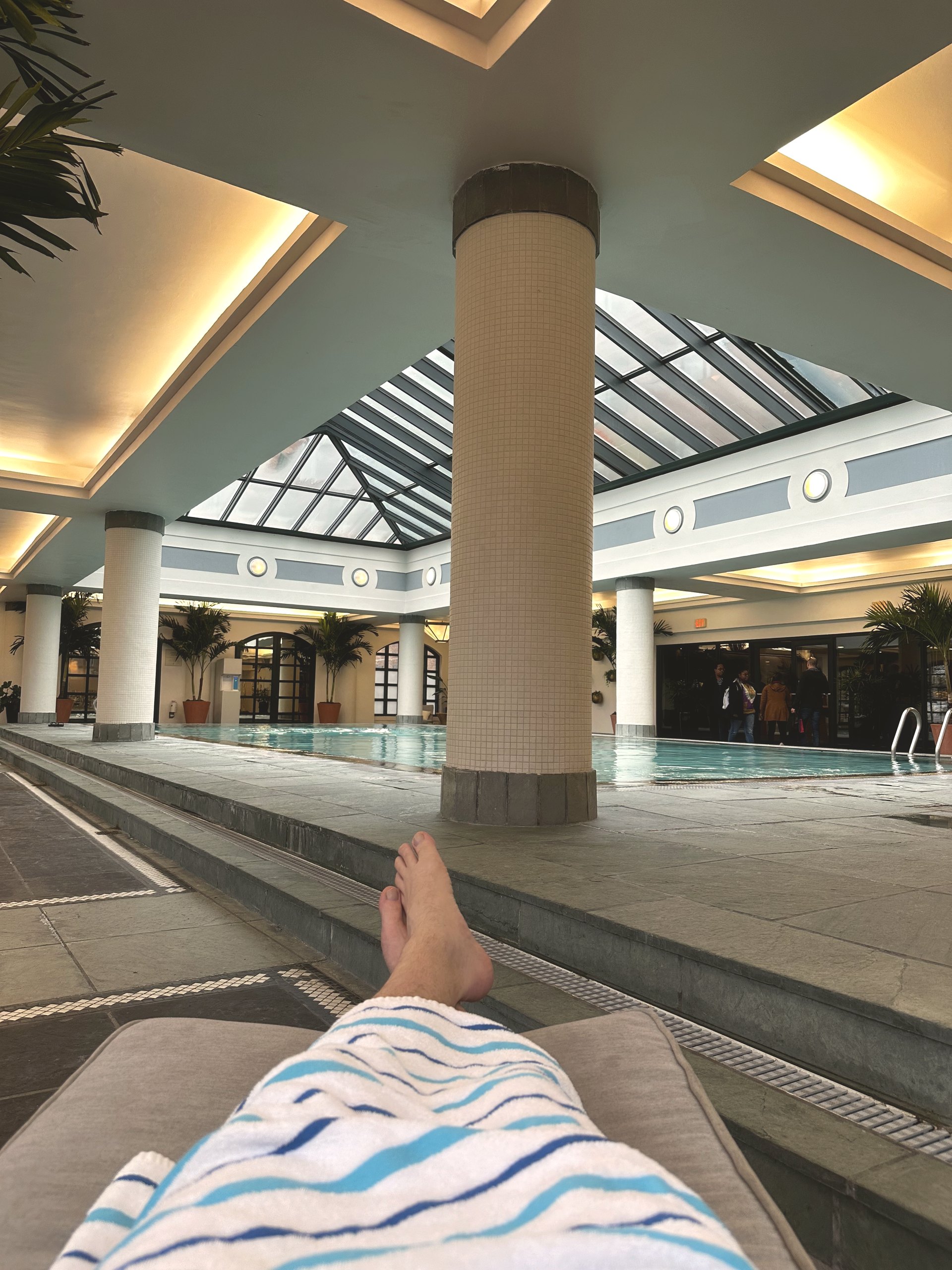 The glass roofed pool atrium at Charleston Place photographed in November 2023 before the renovation
