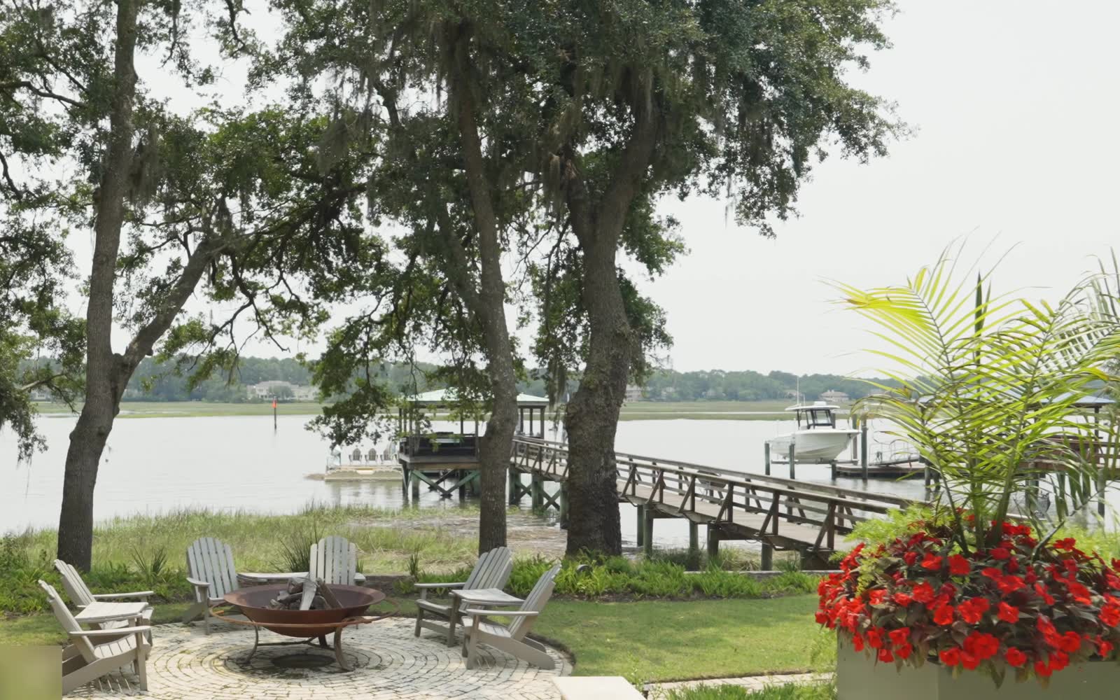The dock, live oaks and deep water behind Tidewater Manor on Hilton Head Island