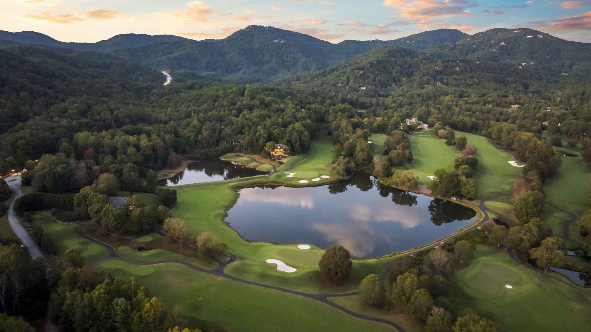 A Cliffs Valley hole running along the lake with the Blue Ridge stacked behind it