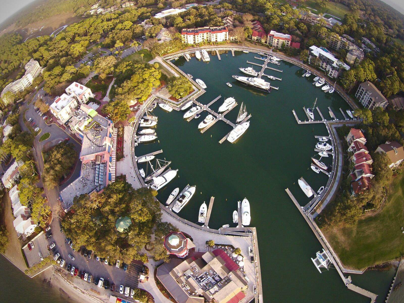 Harbour Town marina from directly above, the yacht basin ringed by its buildings