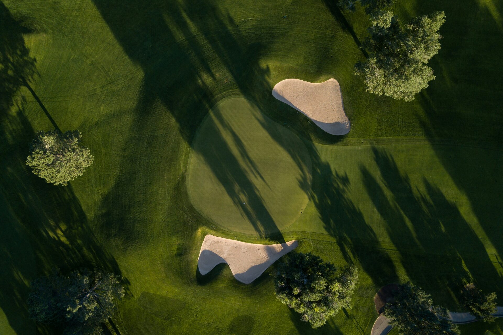 A golf green and bunkers seen from directly above